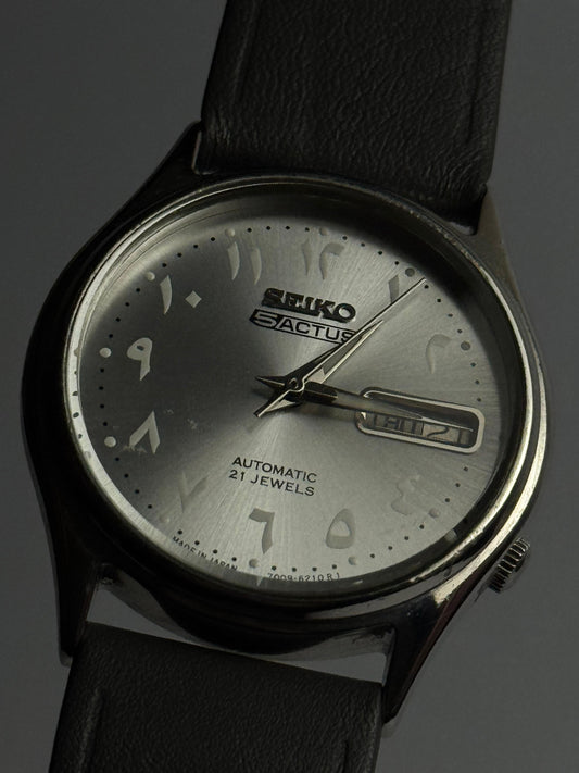 Seiko 5 Actus | Silver Arabic Dial | 21 Jewels Automatic | Grey Leather Strap | Day-Date