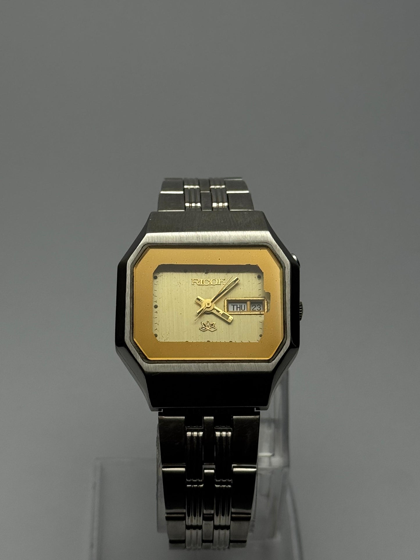 Ricoh Vintage Stainless Steel Rectangular Watch – Two-Tone Gold Dial | Used