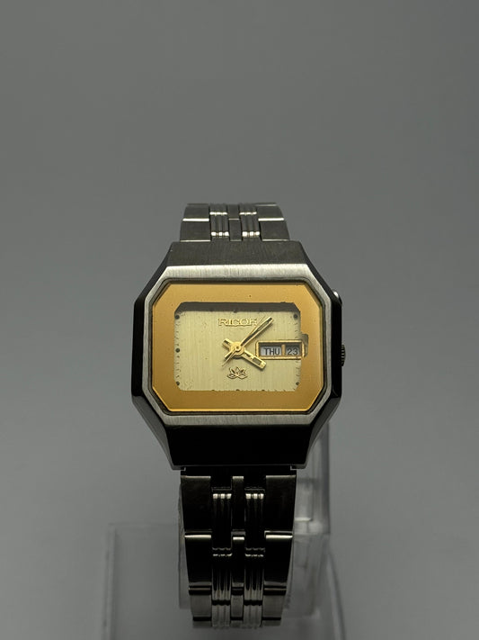 Ricoh Vintage Stainless Steel Rectangular Watch – Two-Tone Gold Dial | Used