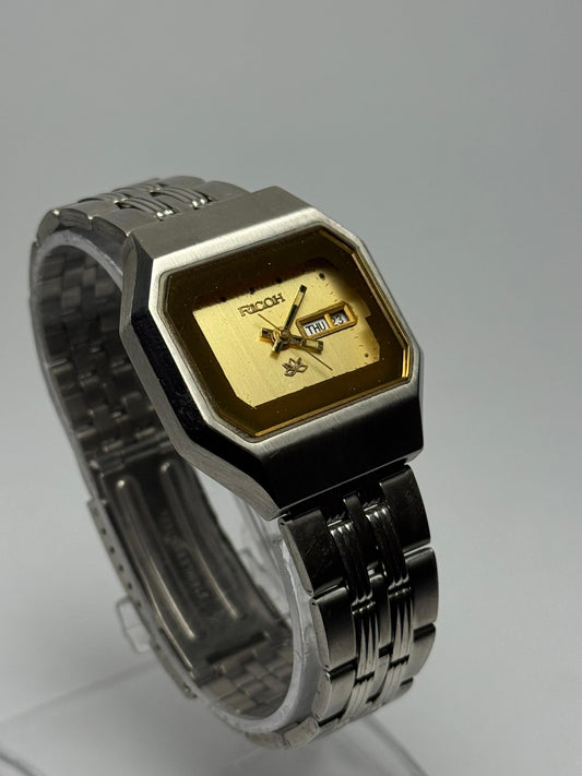 Ricoh Vintage Stainless Steel Rectangular Watch – Two-Tone Gold Dial | Used