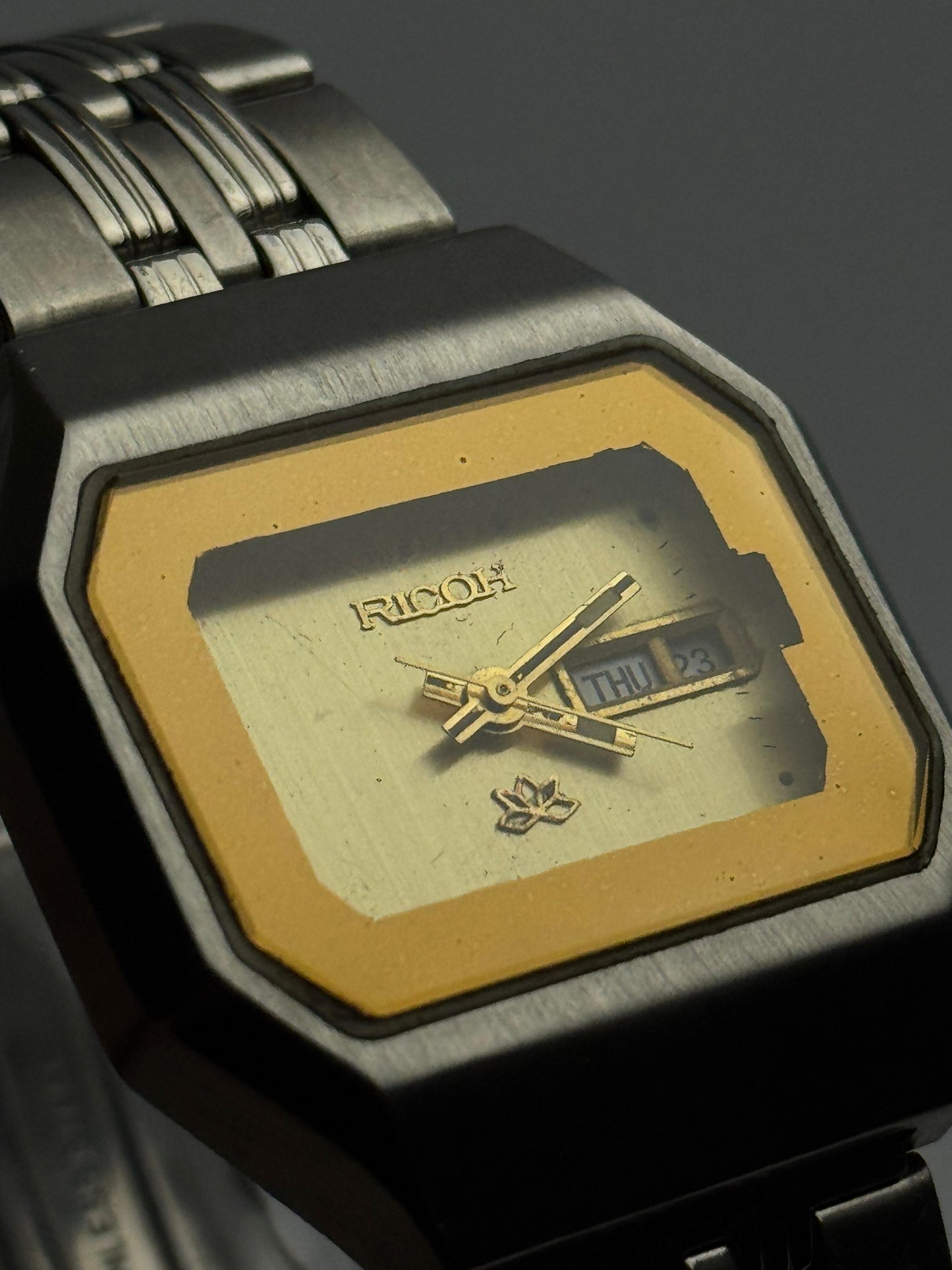 Ricoh Vintage Stainless Steel Rectangular Watch – Two-Tone Gold Dial | Used